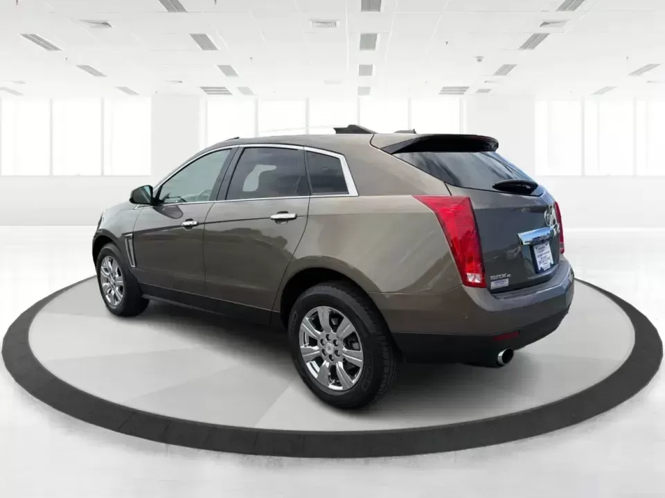 2015 Cadillac SRX Luxury Collection (3GYFNEE39FS) with an 3.6L V-6 gasoline direct injection engine, 6-Speed Automatic transmission, located at 401 Woodman Dr, Riverside, OH, 45431, (937) 908-9800, 39.760899, -84.123421 - 2015 Cadillac SRX Luxury Collection - Photo#4