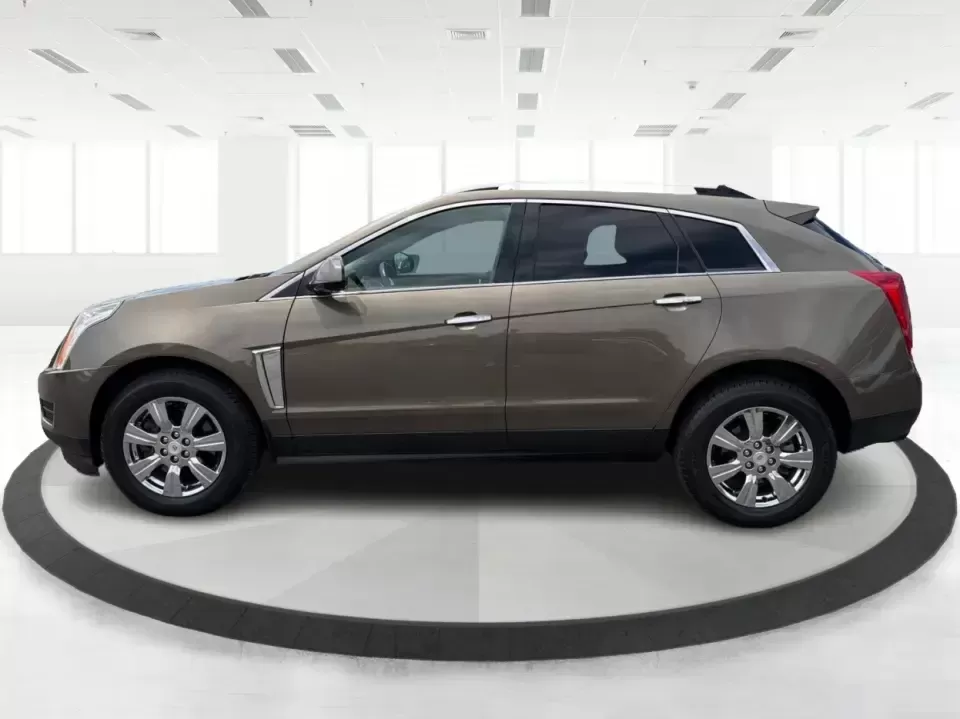 2015 Cadillac SRX Luxury Collection (3GYFNEE39FS) with an 3.6L V-6 gasoline direct injection engine, 6-Speed Automatic transmission, located at 401 Woodman Dr, Riverside, OH, 45431, (937) 908-9800, 39.760899, -84.123421 - 2015 Cadillac SRX Luxury Collection - Photo#5