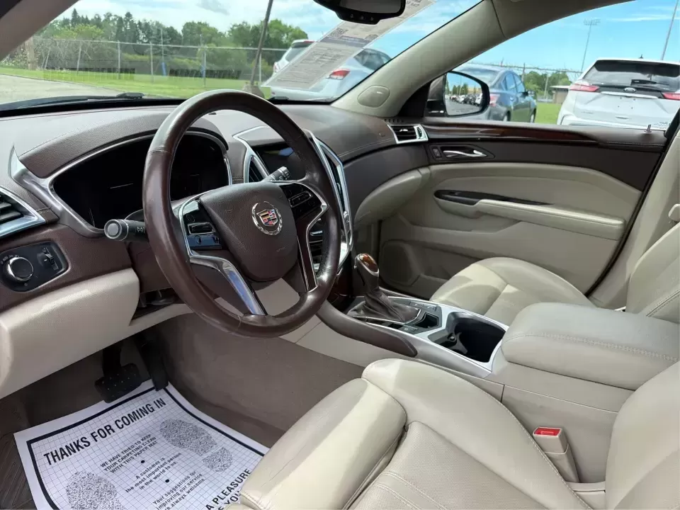 2015 Cadillac SRX Luxury Collection (3GYFNEE39FS) with an 3.6L V-6 gasoline direct injection engine, 6-Speed Automatic transmission, located at 401 Woodman Dr, Riverside, OH, 45431, (937) 908-9800, 39.760899, -84.123421 - 2015 Cadillac SRX Luxury Collection - Photo#9