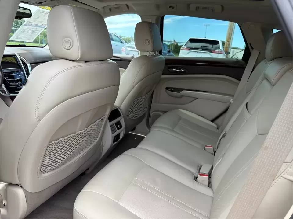 2015 Cadillac SRX Luxury Collection (3GYFNEE39FS) with an 3.6L V-6 gasoline direct injection engine, 6-Speed Automatic transmission, located at 401 Woodman Dr, Riverside, OH, 45431, (937) 908-9800, 39.760899, -84.123421 - 2015 Cadillac SRX Luxury Collection - Photo#10