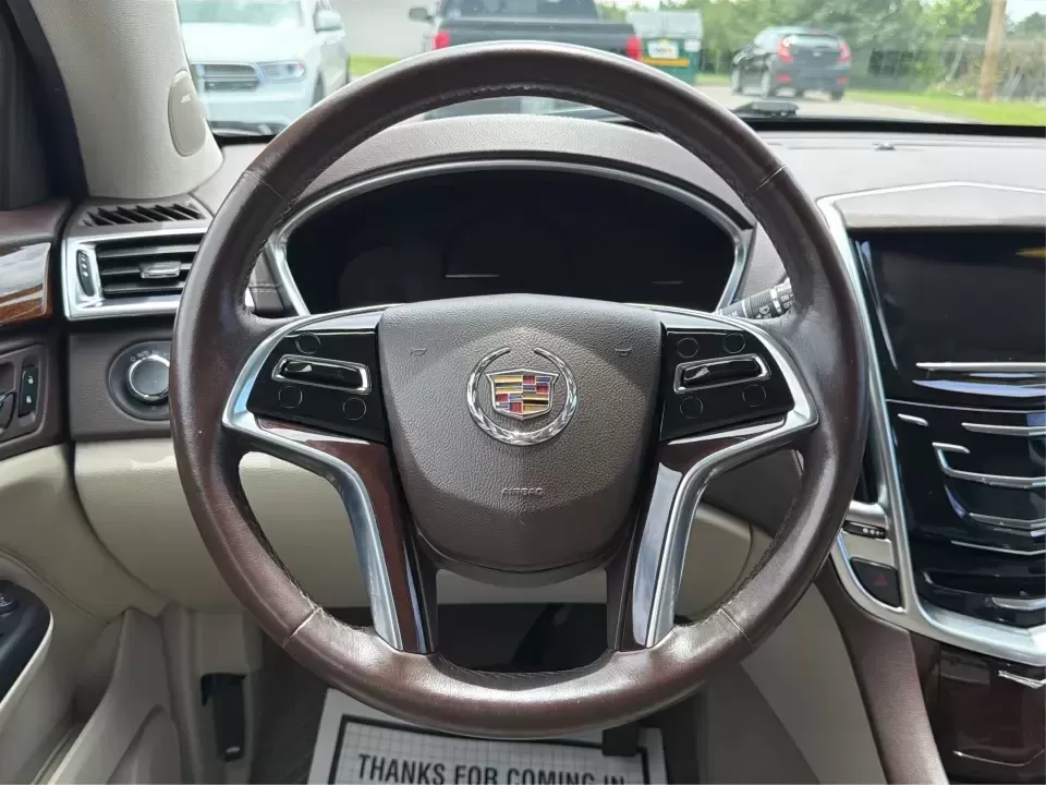 2015 Cadillac SRX Luxury Collection (3GYFNEE39FS) with an 3.6L V-6 gasoline direct injection engine, 6-Speed Automatic transmission, located at 401 Woodman Dr, Riverside, OH, 45431, (937) 908-9800, 39.760899, -84.123421 - 2015 Cadillac SRX Luxury Collection - Photo#16