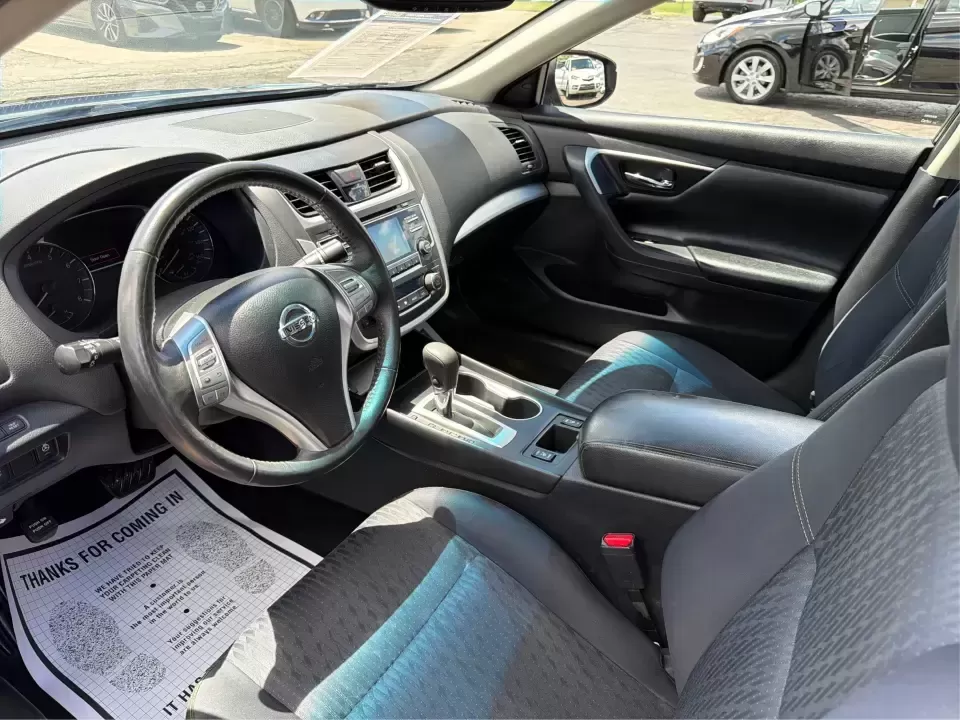 2017 Nissan Altima 2.5 S (1N4AL3AP8HC) with an 2.5L L4 DOHC 16V engine, CVT transmission, located at 4508 South Dixie Dr, Moraine, OH, 45439, (937) 908-9800, 39.689976, -84.218452 - Need a reliable daily driver for I-75 commutes, Wright-Patterson AFB runs, or quick family errands around Dayton? This 2017 Nissan Altima 2.5 SV in Super Black is a smart, comfortable sedan that fits real life in Moraine-easy to park, efficient to live with, and roomy enough for carpools, groceries, - Photo#9