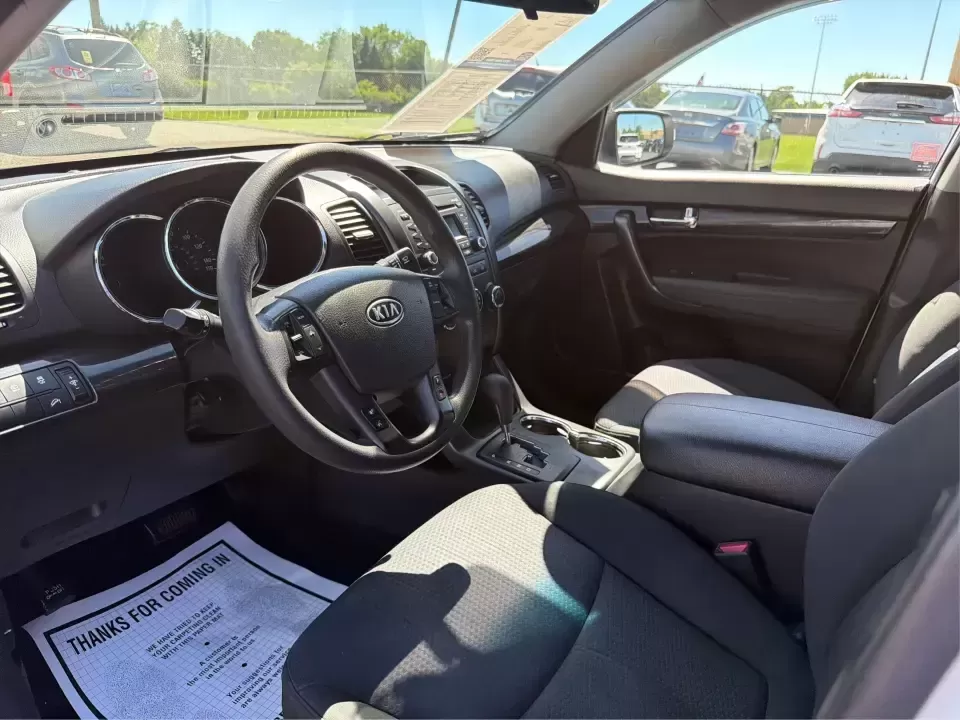2013 Kia Sorento LX (5XYKT3A17DG) with an 2.4L I-4 DOHC engine, 6-Speed Automatic transmission, located at 401 Woodman Dr, Riverside, OH, 45431, (937) 908-9800, 39.760899, -84.123421 - Pack up the kids, load the groceries, or point the GPS toward a weekend getaway-this 2013 Kia Sorento LX is the kind of practical SUV that fits real life in Riverside, Ohio. With confident road manners for daily commuting and flexible space for road trips, it's a smart choice for growing families, b - Photo#9