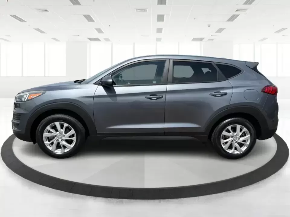 2019 Hyundai Tucson SE AWD (KM8J2CA47KU) with an 2.0L L4 DOHC 16V engine, 6A transmission, located at 1099 N County Rd 25A , Troy, OH, 45373, (937) 908-9800, 40.057079, -84.212883 - Need a dependable SUV that can handle school drop-offs, long commutes up I-75, and spontaneous weekend getaways to Charleston Falls Preserve or a quick lap around the Miami County Fairgrounds? This 2019 Hyundai Tucson SE in Coliseum Gray is a smart, practical choice for drivers who want confident al - Photo#5