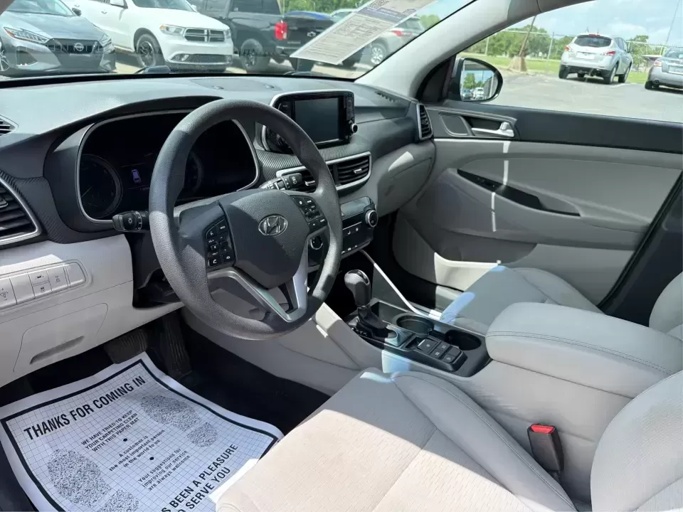 2019 Hyundai Tucson SE AWD (KM8J2CA47KU) with an 2.0L L4 DOHC 16V engine, 6A transmission, located at 1099 N County Rd 25A , Troy, OH, 45373, (937) 908-9800, 40.057079, -84.212883 - Need a dependable SUV that can handle school drop-offs, long commutes up I-75, and spontaneous weekend getaways to Charleston Falls Preserve or a quick lap around the Miami County Fairgrounds? This 2019 Hyundai Tucson SE in Coliseum Gray is a smart, practical choice for drivers who want confident al - Photo#9