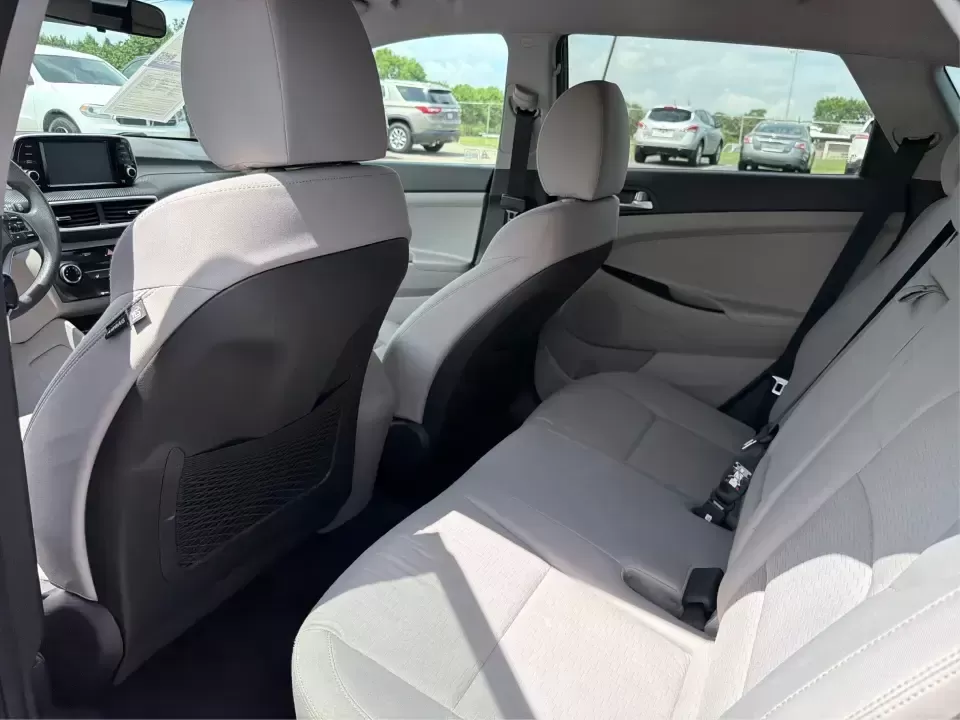 2019 Hyundai Tucson SE AWD (KM8J2CA47KU) with an 2.0L L4 DOHC 16V engine, 6A transmission, located at 1099 N County Rd 25A , Troy, OH, 45373, (937) 908-9800, 40.057079, -84.212883 - Need a dependable SUV that can handle school drop-offs, long commutes up I-75, and spontaneous weekend getaways to Charleston Falls Preserve or a quick lap around the Miami County Fairgrounds? This 2019 Hyundai Tucson SE in Coliseum Gray is a smart, practical choice for drivers who want confident al - Photo#10