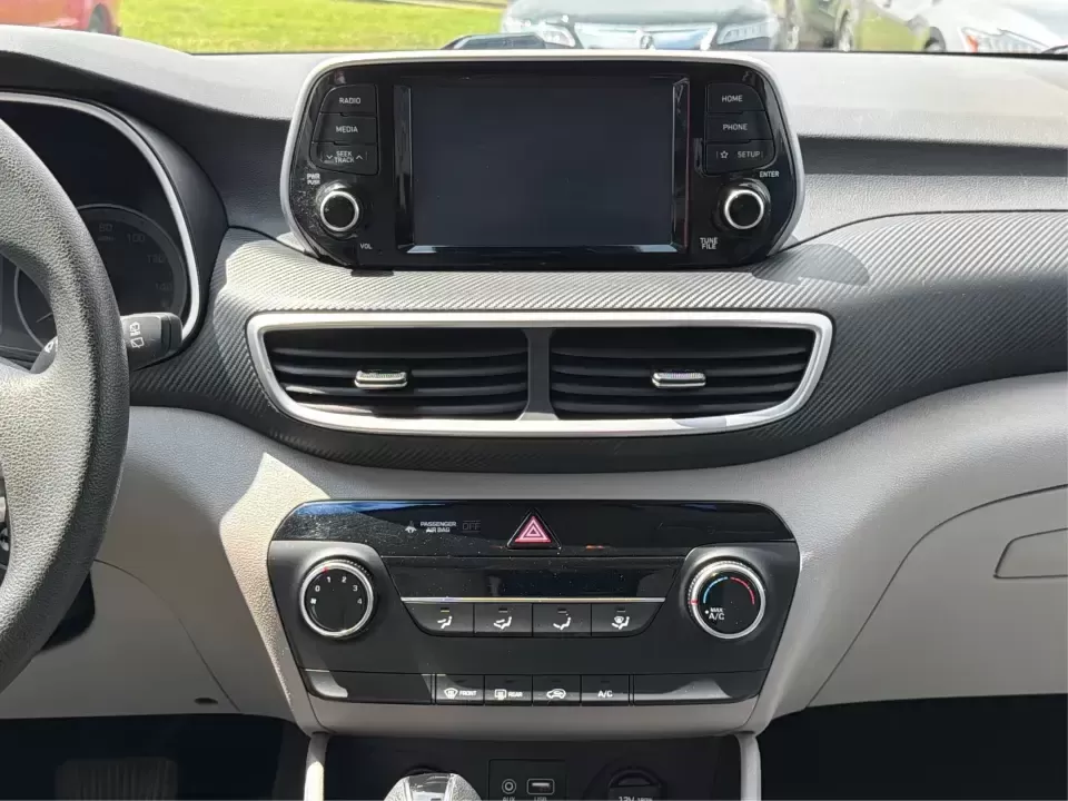 2019 Hyundai Tucson SE AWD (KM8J2CA47KU) with an 2.0L L4 DOHC 16V engine, 6A transmission, located at 1099 N County Rd 25A , Troy, OH, 45373, (937) 908-9800, 40.057079, -84.212883 - Need a dependable SUV that can handle school drop-offs, long commutes up I-75, and spontaneous weekend getaways to Charleston Falls Preserve or a quick lap around the Miami County Fairgrounds? This 2019 Hyundai Tucson SE in Coliseum Gray is a smart, practical choice for drivers who want confident al - Photo#13