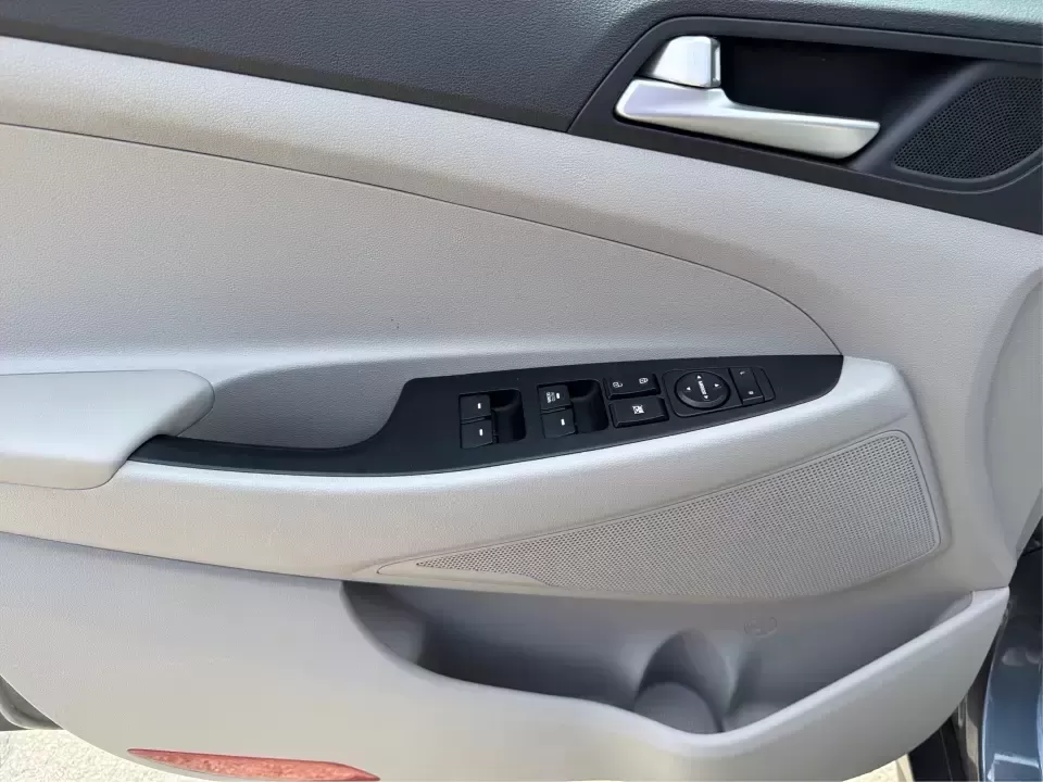 2019 Hyundai Tucson SE AWD (KM8J2CA47KU) with an 2.0L L4 DOHC 16V engine, 6A transmission, located at 1099 N County Rd 25A , Troy, OH, 45373, (937) 908-9800, 40.057079, -84.212883 - Need a dependable SUV that can handle school drop-offs, long commutes up I-75, and spontaneous weekend getaways to Charleston Falls Preserve or a quick lap around the Miami County Fairgrounds? This 2019 Hyundai Tucson SE in Coliseum Gray is a smart, practical choice for drivers who want confident al - Photo#18