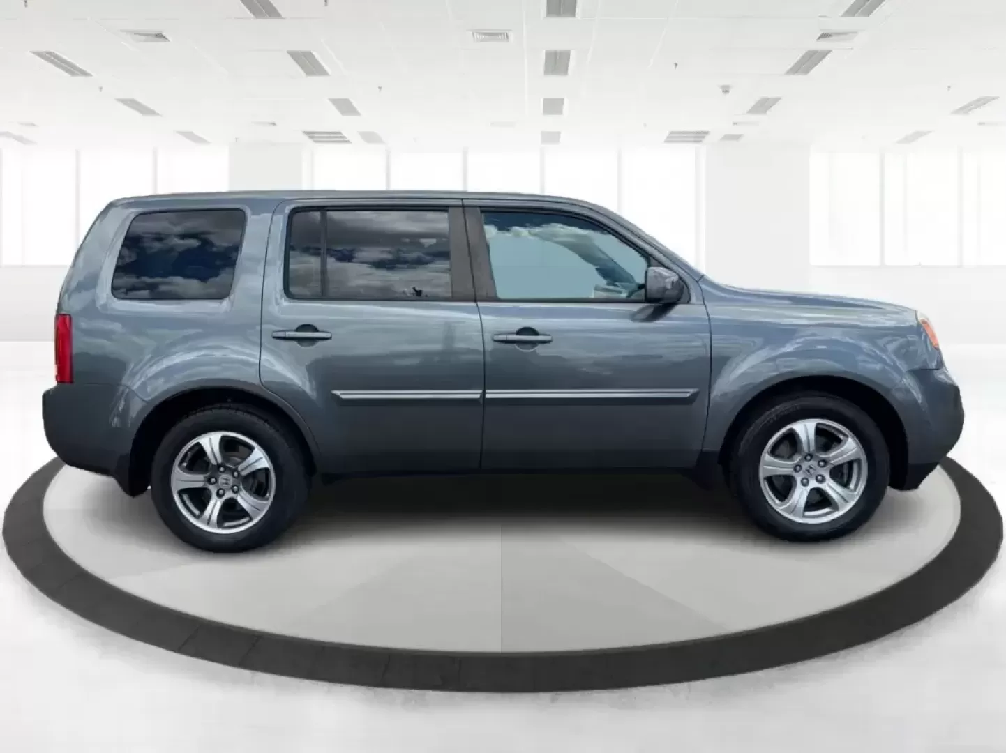 2012 Honda Pilot EX 4WD 5-Spd AT (5FNYF4H46CB) with an 3.5L V6 SOHC 24V engine, 5-Speed Automatic transmission, located at 401 Woodman Dr, Riverside, OH, 45431, (937) 908-9800, 39.760899, -84.123421 - Picture your next Ohio weekend: the kids packed up, coolers in the back, and plenty of room for friends-then cruising from Piqua to Indian Lake or over to Dayton without feeling cramped. This 2012 Honda Pilot EX 4WD is built for real life, whether you're tackling school drop-offs, long commutes on I - Photo#1