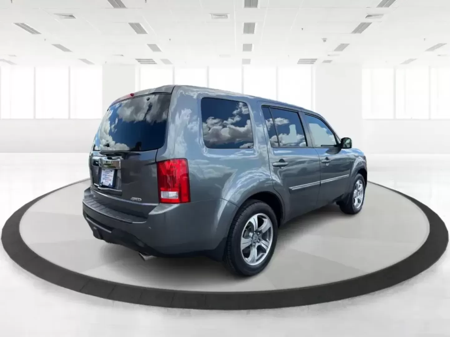 2012 Honda Pilot EX 4WD 5-Spd AT (5FNYF4H46CB) with an 3.5L V6 SOHC 24V engine, 5-Speed Automatic transmission, located at 401 Woodman Dr, Riverside, OH, 45431, (937) 908-9800, 39.760899, -84.123421 - Picture your next Ohio weekend: the kids packed up, coolers in the back, and plenty of room for friends-then cruising from Piqua to Indian Lake or over to Dayton without feeling cramped. This 2012 Honda Pilot EX 4WD is built for real life, whether you're tackling school drop-offs, long commutes on I - Photo#2