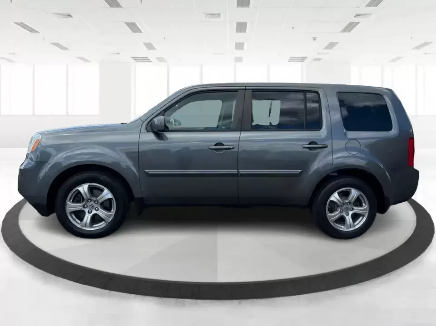 2012 Honda Pilot EX 4WD 5-Spd AT (5FNYF4H46CB) with an 3.5L V6 SOHC 24V engine, 5-Speed Automatic transmission, located at 401 Woodman Dr, Riverside, OH, 45431, (937) 908-9800, 39.760899, -84.123421 - Picture your next Ohio weekend: the kids packed up, coolers in the back, and plenty of room for friends-then cruising from Piqua to Indian Lake or over to Dayton without feeling cramped. This 2012 Honda Pilot EX 4WD is built for real life, whether you're tackling school drop-offs, long commutes on I - Photo#5