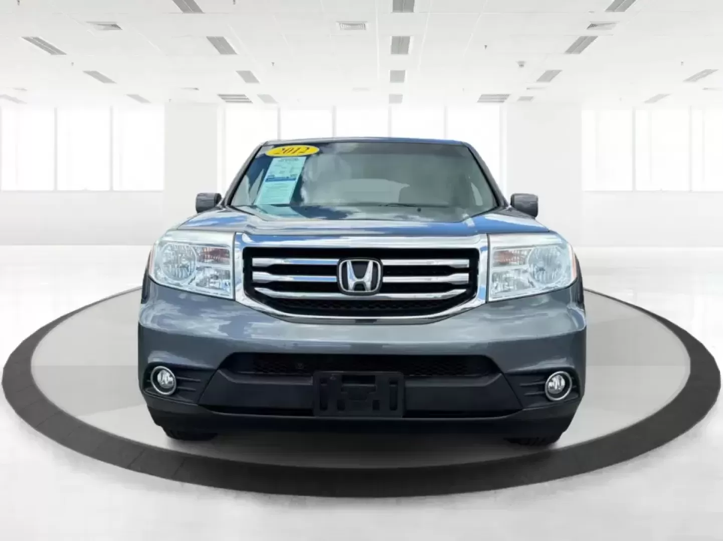 2012 Honda Pilot EX 4WD 5-Spd AT (5FNYF4H46CB) with an 3.5L V6 SOHC 24V engine, 5-Speed Automatic transmission, located at 401 Woodman Dr, Riverside, OH, 45431, (937) 908-9800, 39.760899, -84.123421 - Picture your next Ohio weekend: the kids packed up, coolers in the back, and plenty of room for friends-then cruising from Piqua to Indian Lake or over to Dayton without feeling cramped. This 2012 Honda Pilot EX 4WD is built for real life, whether you're tackling school drop-offs, long commutes on I - Photo#7