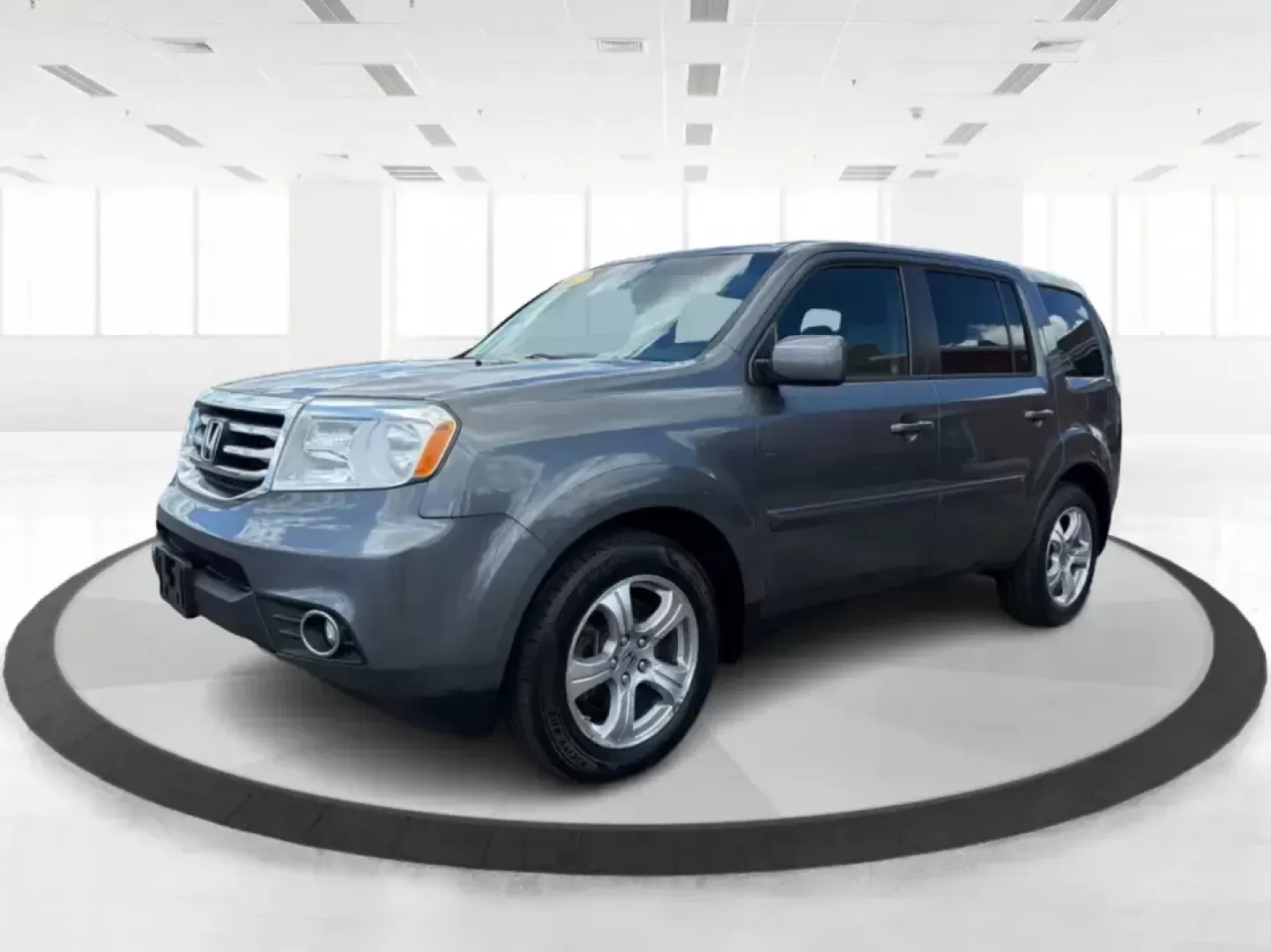2012 Honda Pilot EX 4WD 5-Spd AT (5FNYF4H46CB) with an 3.5L V6 SOHC 24V engine, 5-Speed Automatic transmission, located at 401 Woodman Dr, Riverside, OH, 45431, (937) 908-9800, 39.760899, -84.123421 - Picture your next Ohio weekend: the kids packed up, coolers in the back, and plenty of room for friends-then cruising from Piqua to Indian Lake or over to Dayton without feeling cramped. This 2012 Honda Pilot EX 4WD is built for real life, whether you're tackling school drop-offs, long commutes on I - Photo#8