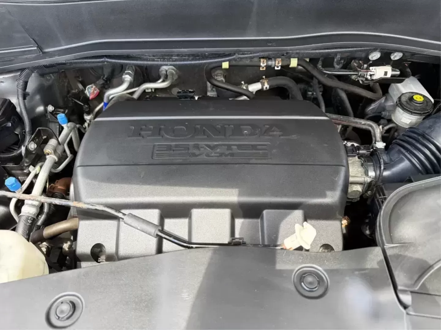 2012 Honda Pilot EX 4WD 5-Spd AT (5FNYF4H46CB) with an 3.5L V6 SOHC 24V engine, 5-Speed Automatic transmission, located at 401 Woodman Dr, Riverside, OH, 45431, (937) 908-9800, 39.760899, -84.123421 - Picture your next Ohio weekend: the kids packed up, coolers in the back, and plenty of room for friends-then cruising from Piqua to Indian Lake or over to Dayton without feeling cramped. This 2012 Honda Pilot EX 4WD is built for real life, whether you're tackling school drop-offs, long commutes on I - Photo#11