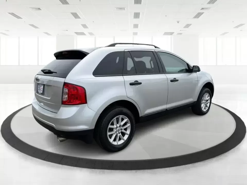2014 Ford Edge SE FWD (2FMDK3GC0EB) with an 3.5L V6 DOHC 24V engine, 6-Speed Automatic transmission, located at 880 E. National Road, Vandalia, OH, 45377, (937) 908-9800, 39.891918, -84.183594 - Need an SUV that fits real life in the Miami Valley-school drop-offs, a steady commute, and weekend errands-without feeling bulky or hard to park? This 2014 Ford Edge SE FWD is a smart, comfortable choice for everyday drivers who want roomy seating for five, useful tech, and confident road manners f - Photo#2