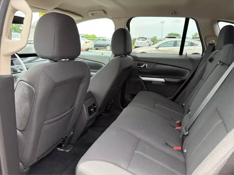 2014 Ford Edge SE FWD (2FMDK3GC0EB) with an 3.5L V6 DOHC 24V engine, 6-Speed Automatic transmission, located at 880 E. National Road, Vandalia, OH, 45377, (937) 908-9800, 39.891918, -84.183594 - Need an SUV that fits real life in the Miami Valley-school drop-offs, a steady commute, and weekend errands-without feeling bulky or hard to park? This 2014 Ford Edge SE FWD is a smart, comfortable choice for everyday drivers who want roomy seating for five, useful tech, and confident road manners f - Photo#10