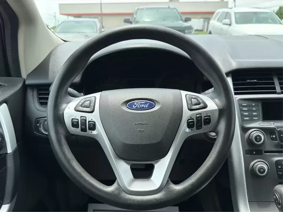 2014 Ford Edge SE FWD (2FMDK3GC0EB) with an 3.5L V6 DOHC 24V engine, 6-Speed Automatic transmission, located at 880 E. National Road, Vandalia, OH, 45377, (937) 908-9800, 39.891918, -84.183594 - Need an SUV that fits real life in the Miami Valley-school drop-offs, a steady commute, and weekend errands-without feeling bulky or hard to park? This 2014 Ford Edge SE FWD is a smart, comfortable choice for everyday drivers who want roomy seating for five, useful tech, and confident road manners f - Photo#16