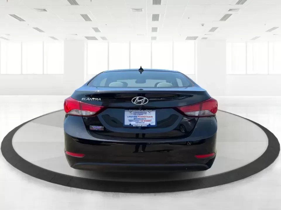 2016 Hyundai Elantra Limited (5NPDH4AE8GH) with an 1.8L L4 DOHC 16V engine, 6-Speed Automatic transmission, located at 4508 South Dixie Dr, Moraine, OH, 45439, (937) 908-9800, 39.689976, -84.218452 - Picture an easy weekday routine: a comfortable, fuel-sipping sedan for the commute down South Dixie Drive, quick school drop-offs, and a smooth Friday escape to Carillon Historical Park or a Dayton Dragons game. This **2016 Hyundai Elantra Limited** in **Phantom Black** is the kind of practical, pol - Photo#3
