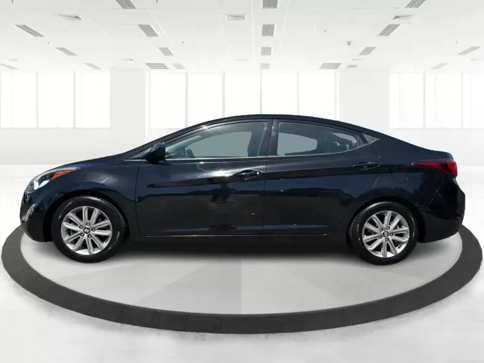 2016 Hyundai Elantra Limited (5NPDH4AE8GH) with an 1.8L L4 DOHC 16V engine, 6-Speed Automatic transmission, located at 4508 South Dixie Dr, Moraine, OH, 45439, (937) 908-9800, 39.689976, -84.218452 - Picture an easy weekday routine: a comfortable, fuel-sipping sedan for the commute down South Dixie Drive, quick school drop-offs, and a smooth Friday escape to Carillon Historical Park or a Dayton Dragons game. This **2016 Hyundai Elantra Limited** in **Phantom Black** is the kind of practical, pol - Photo#5