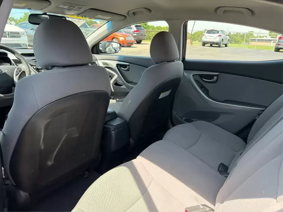 2016 Hyundai Elantra Limited (5NPDH4AE8GH) with an 1.8L L4 DOHC 16V engine, 6-Speed Automatic transmission, located at 4508 South Dixie Dr, Moraine, OH, 45439, (937) 908-9800, 39.689976, -84.218452 - Picture an easy weekday routine: a comfortable, fuel-sipping sedan for the commute down South Dixie Drive, quick school drop-offs, and a smooth Friday escape to Carillon Historical Park or a Dayton Dragons game. This **2016 Hyundai Elantra Limited** in **Phantom Black** is the kind of practical, pol - Photo#10