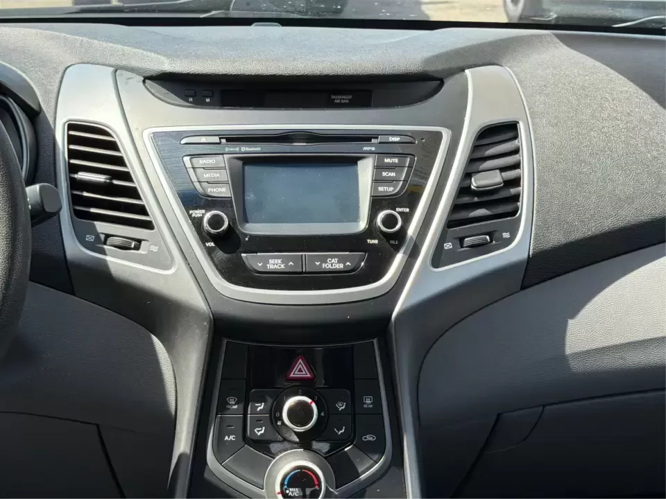 2016 Hyundai Elantra Limited (5NPDH4AE8GH) with an 1.8L L4 DOHC 16V engine, 6-Speed Automatic transmission, located at 4508 South Dixie Dr, Moraine, OH, 45439, (937) 908-9800, 39.689976, -84.218452 - Picture an easy weekday routine: a comfortable, fuel-sipping sedan for the commute down South Dixie Drive, quick school drop-offs, and a smooth Friday escape to Carillon Historical Park or a Dayton Dragons game. This **2016 Hyundai Elantra Limited** in **Phantom Black** is the kind of practical, pol - Photo#13