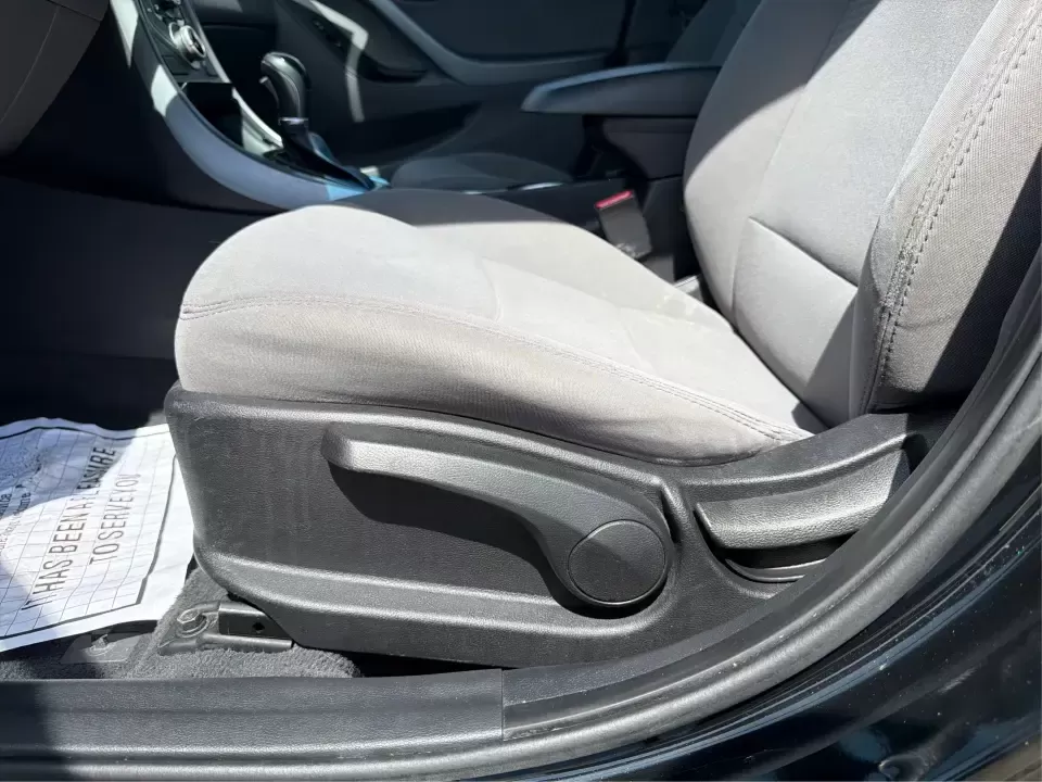 2016 Hyundai Elantra Limited (5NPDH4AE8GH) with an 1.8L L4 DOHC 16V engine, 6-Speed Automatic transmission, located at 4508 South Dixie Dr, Moraine, OH, 45439, (937) 908-9800, 39.689976, -84.218452 - Picture an easy weekday routine: a comfortable, fuel-sipping sedan for the commute down South Dixie Drive, quick school drop-offs, and a smooth Friday escape to Carillon Historical Park or a Dayton Dragons game. This **2016 Hyundai Elantra Limited** in **Phantom Black** is the kind of practical, pol - Photo#18