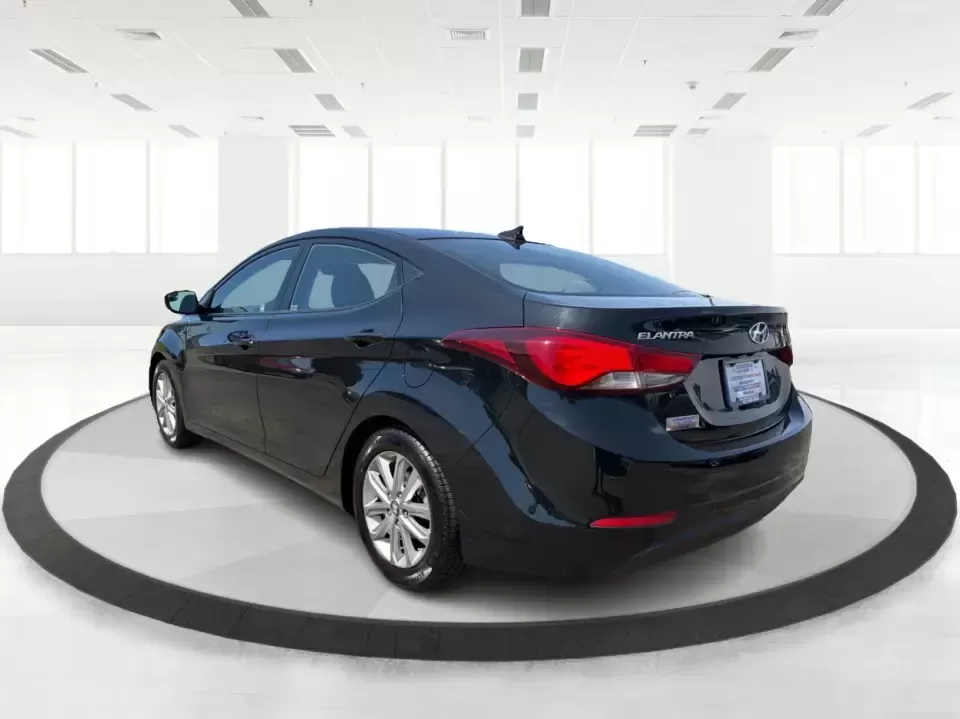 2016 Hyundai Elantra Limited (5NPDH4AE8GH) with an 1.8L L4 DOHC 16V engine, 6-Speed Automatic transmission, located at 1230 East Main St, Xenia, OH, 45385, (937) 908-9800, 39.688026, -83.910172 - Need a dependable commuter that still feels upscale for date night in downtown Xenia, quick school drop-offs, and weekend runs to Caesar Creek? This 2016 Hyundai Elantra Limited in Phantom Black is a smart, budget-friendly sedan built for daily life in Greene County-easy to park, comfortable for fiv - Photo#4