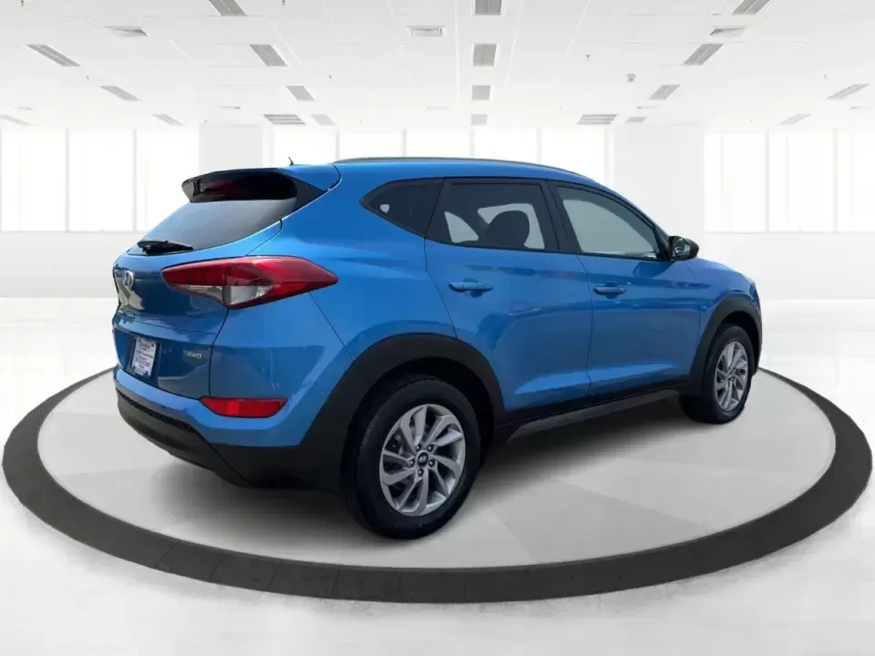 2016 Hyundai Tucson SE w/Preferred Package AWD (KM8J3CA41GU) with an 2.0L L4 DOHC 16V engine, 6A transmission, located at 401 Woodman Dr, Riverside, OH, 45431, (937) 908-9800, 39.760899, -84.123421 - Need an SUV that can handle Dayton-area commutes, rainy school drop-offs, and spontaneous weekend getaways without feeling oversized? This 2016 Hyundai Tucson SE w/Preferred Package AWD in eye-catching Caribbean Blue is built for real life-comfortable for daily drives, confident when the weather tur - Photo#2