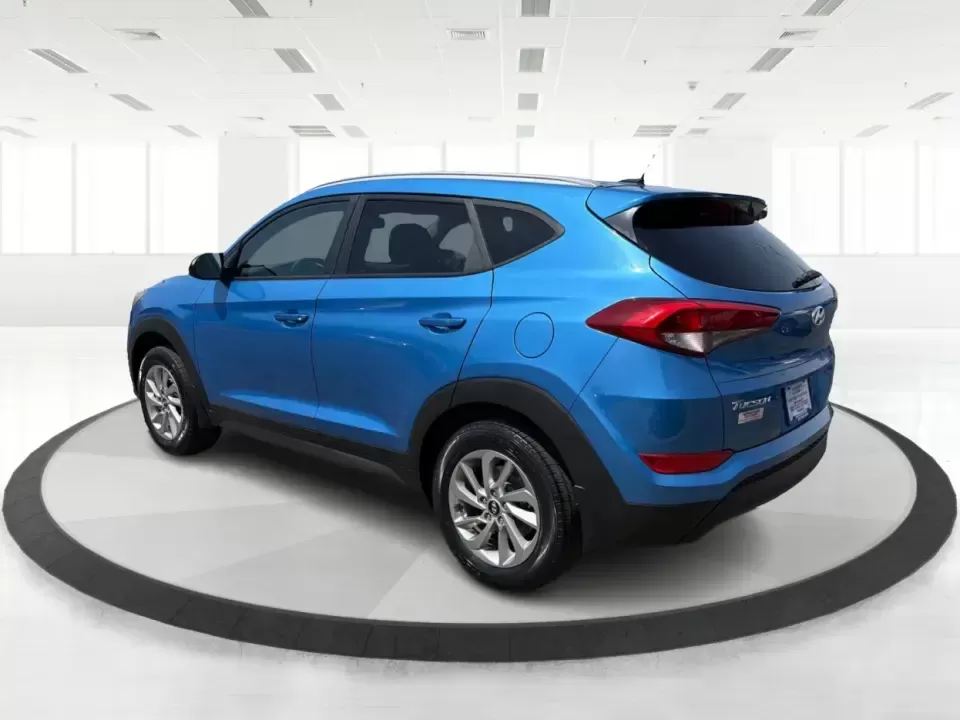 2016 Hyundai Tucson SE w/Preferred Package AWD (KM8J3CA41GU) with an 2.0L L4 DOHC 16V engine, 6A transmission, located at 401 Woodman Dr, Riverside, OH, 45431, (937) 908-9800, 39.760899, -84.123421 - Need an SUV that can handle Dayton-area commutes, rainy school drop-offs, and spontaneous weekend getaways without feeling oversized? This 2016 Hyundai Tucson SE w/Preferred Package AWD in eye-catching Caribbean Blue is built for real life-comfortable for daily drives, confident when the weather tur - Photo#4