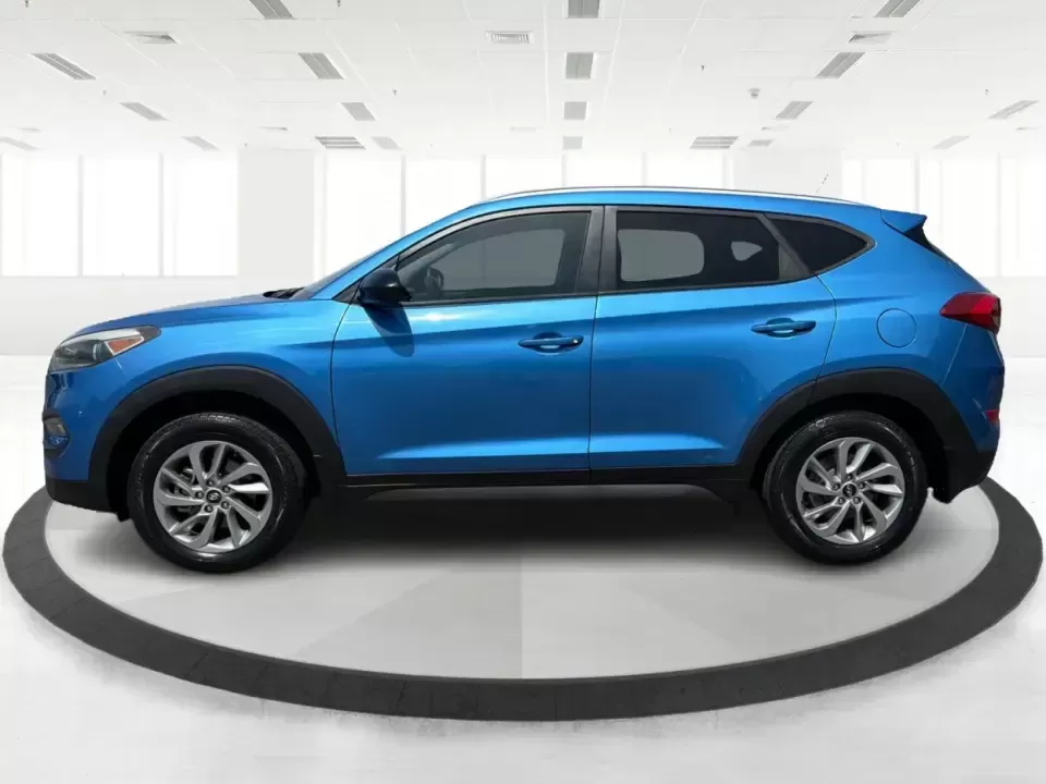 2016 Hyundai Tucson SE w/Preferred Package AWD (KM8J3CA41GU) with an 2.0L L4 DOHC 16V engine, 6A transmission, located at 401 Woodman Dr, Riverside, OH, 45431, (937) 908-9800, 39.760899, -84.123421 - Need an SUV that can handle Dayton-area commutes, rainy school drop-offs, and spontaneous weekend getaways without feeling oversized? This 2016 Hyundai Tucson SE w/Preferred Package AWD in eye-catching Caribbean Blue is built for real life-comfortable for daily drives, confident when the weather tur - Photo#5