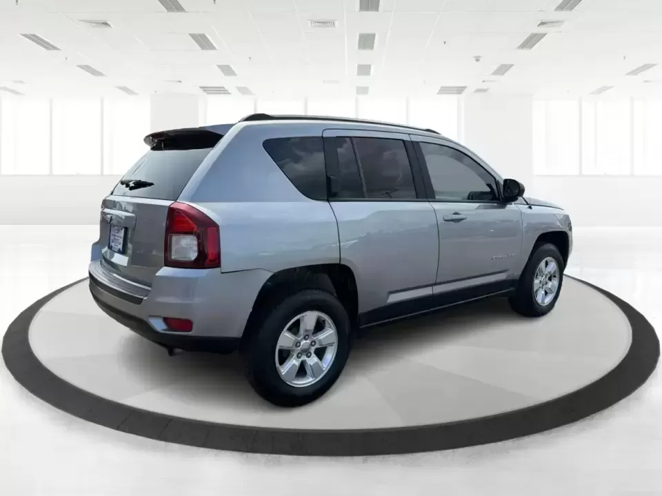 2015 Jeep Compass Sport FWD (1C4NJCBA6FD) with an 2.0L L4 DOHC 16V engine, located at 880 E. National Road, Vandalia, OH, 45377, (937) 908-9800, 39.891918, -84.183594 - Weekday commutes down I75, school drop-offs in Butler Township, and quick weekend getaways to the National Museum of the U.S. Air Force or Taylorsville MetroPark all call for an SUV that's easy to live with, comfortable for five, and efficient enough to keep your budget in check. This **2015 Jeep Co - Photo#2