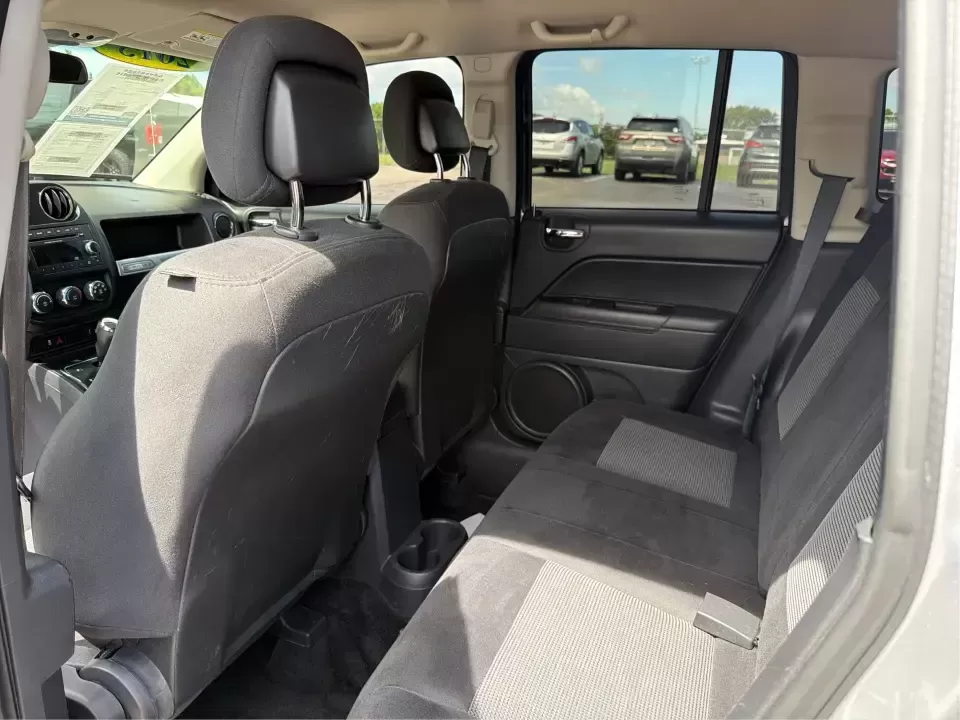 2015 Jeep Compass Sport FWD (1C4NJCBA6FD) with an 2.0L L4 DOHC 16V engine, located at 880 E. National Road, Vandalia, OH, 45377, (937) 908-9800, 39.891918, -84.183594 - Weekday commutes down I75, school drop-offs in Butler Township, and quick weekend getaways to the National Museum of the U.S. Air Force or Taylorsville MetroPark all call for an SUV that's easy to live with, comfortable for five, and efficient enough to keep your budget in check. This **2015 Jeep Co - Photo#10