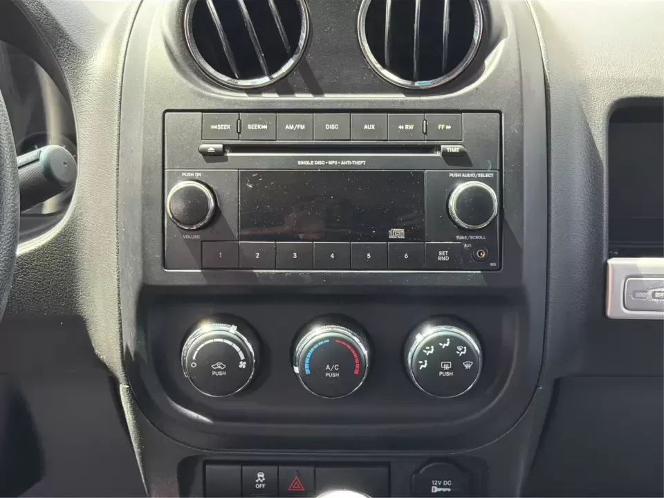 2015 Jeep Compass Sport FWD (1C4NJCBA6FD) with an 2.0L L4 DOHC 16V engine, located at 880 E. National Road, Vandalia, OH, 45377, (937) 908-9800, 39.891918, -84.183594 - Weekday commutes down I75, school drop-offs in Butler Township, and quick weekend getaways to the National Museum of the U.S. Air Force or Taylorsville MetroPark all call for an SUV that's easy to live with, comfortable for five, and efficient enough to keep your budget in check. This **2015 Jeep Co - Photo#13