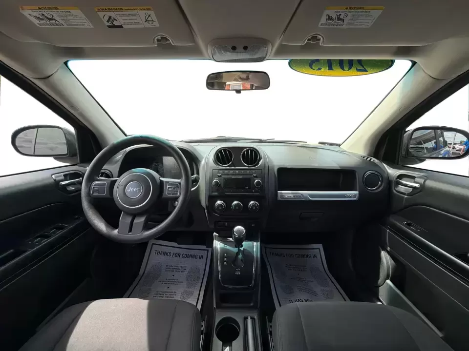2015 Jeep Compass Sport FWD (1C4NJCBA6FD) with an 2.0L L4 DOHC 16V engine, located at 880 E. National Road, Vandalia, OH, 45377, (937) 908-9800, 39.891918, -84.183594 - Weekday commutes down I75, school drop-offs in Butler Township, and quick weekend getaways to the National Museum of the U.S. Air Force or Taylorsville MetroPark all call for an SUV that's easy to live with, comfortable for five, and efficient enough to keep your budget in check. This **2015 Jeep Co - Photo#19