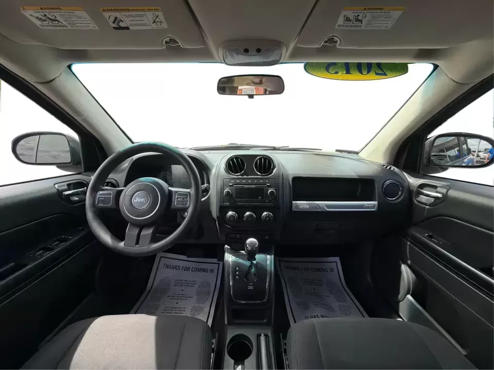 2015 Jeep Compass Sport FWD (1C4NJCBA6FD) with an 2.0L L4 DOHC 16V engine, located at 880 E. National Road, Vandalia, OH, 45377, (937) 908-9800, 39.891918, -84.183594 - Weekday commutes down I75, school drop-offs in Butler Township, and quick weekend getaways to the National Museum of the U.S. Air Force or Taylorsville MetroPark all call for an SUV that's easy to live with, comfortable for five, and efficient enough to keep your budget in check. This **2015 Jeep Co - Photo#20