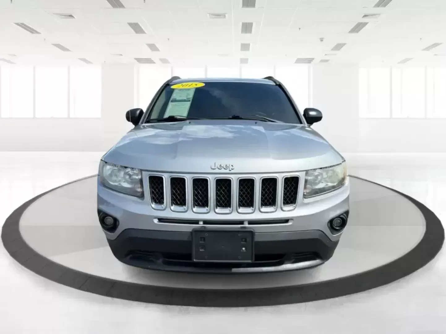 2015 Jeep Compass Sport FWD (1C4NJCBA6FD) with an 2.0L L4 DOHC 16V engine, located at 1951 S Dayton Lakeview Rd., New Carlisle, OH, 45344, (937) 908-9800, 39.890999, -84.050255 - Whether your week looks like a daily commute down I70, school drop-offs around Clark County, or a quick weekend escape to Buck Creek State Park, this **2015 Jeep Compass Sport FWD** is the kind of compact SUV that fits real life. With seating for **five**, easy-to-park sizing, and the versatile carg- Photo#7