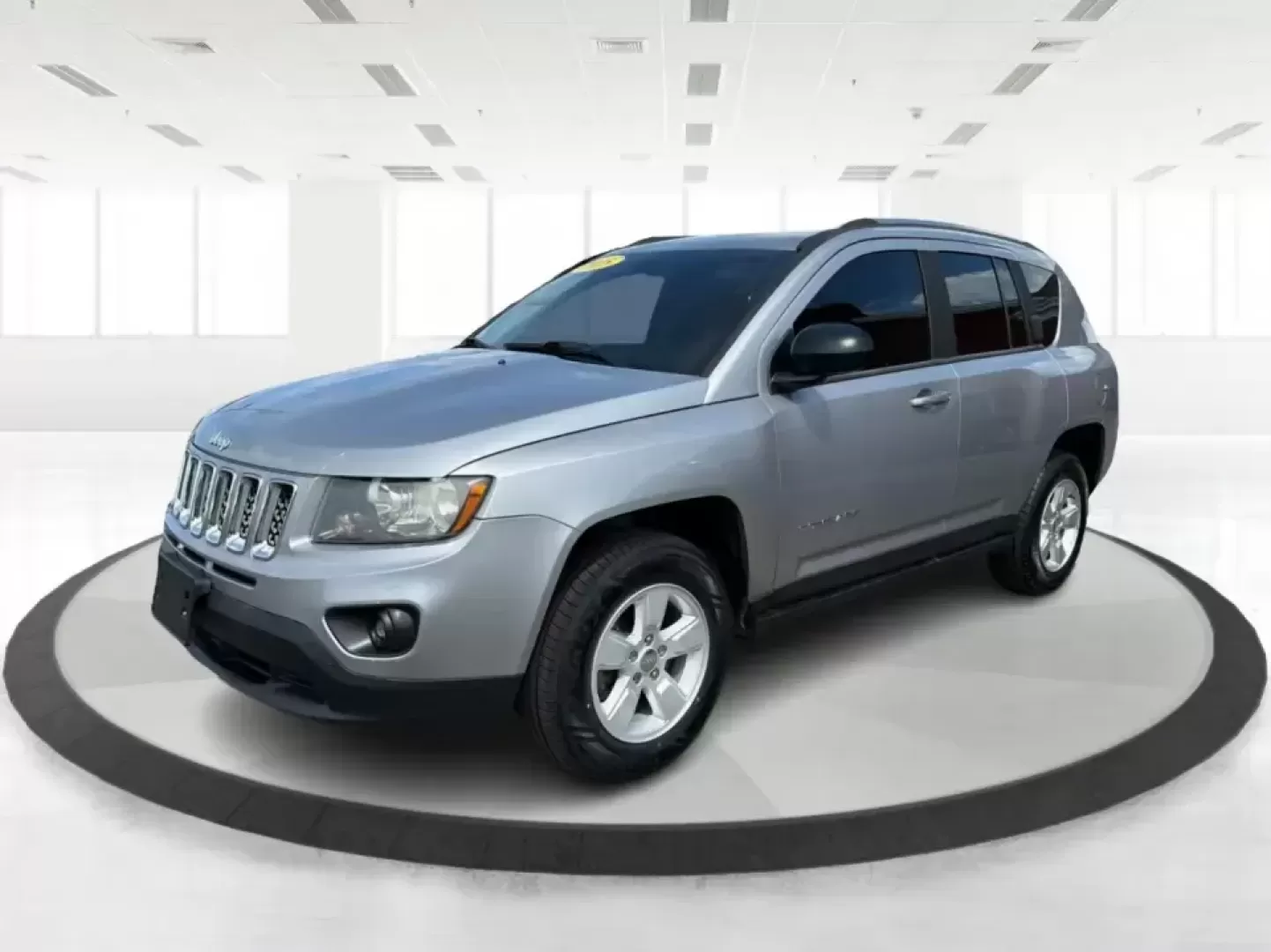 2015 Jeep Compass Sport FWD (1C4NJCBA6FD) with an 2.0L L4 DOHC 16V engine, located at 1951 S Dayton Lakeview Rd., New Carlisle, OH, 45344, (937) 908-9800, 39.890999, -84.050255 - Whether your week looks like a daily commute down I70, school drop-offs around Clark County, or a quick weekend escape to Buck Creek State Park, this **2015 Jeep Compass Sport FWD** is the kind of compact SUV that fits real life. With seating for **five**, easy-to-park sizing, and the versatile carg- Photo#8