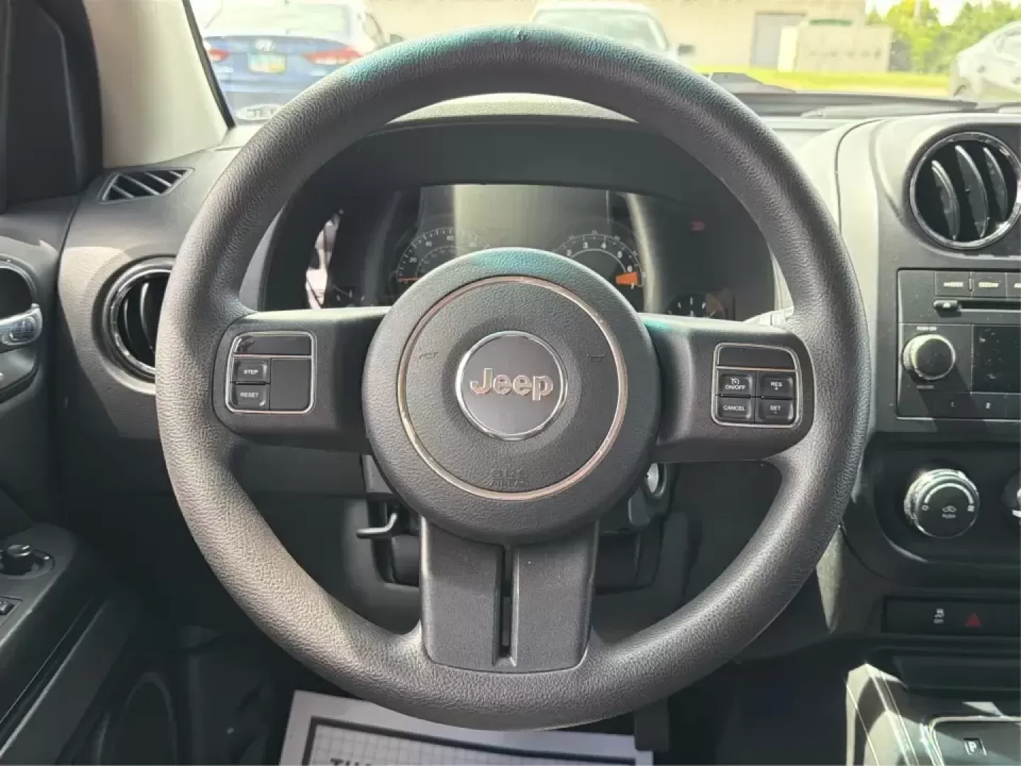 2015 Jeep Compass Sport FWD (1C4NJCBA6FD) with an 2.0L L4 DOHC 16V engine, located at 1951 S Dayton Lakeview Rd., New Carlisle, OH, 45344, (937) 908-9800, 39.890999, -84.050255 - Whether your week looks like a daily commute down I70, school drop-offs around Clark County, or a quick weekend escape to Buck Creek State Park, this **2015 Jeep Compass Sport FWD** is the kind of compact SUV that fits real life. With seating for **five**, easy-to-park sizing, and the versatile carg- Photo#16