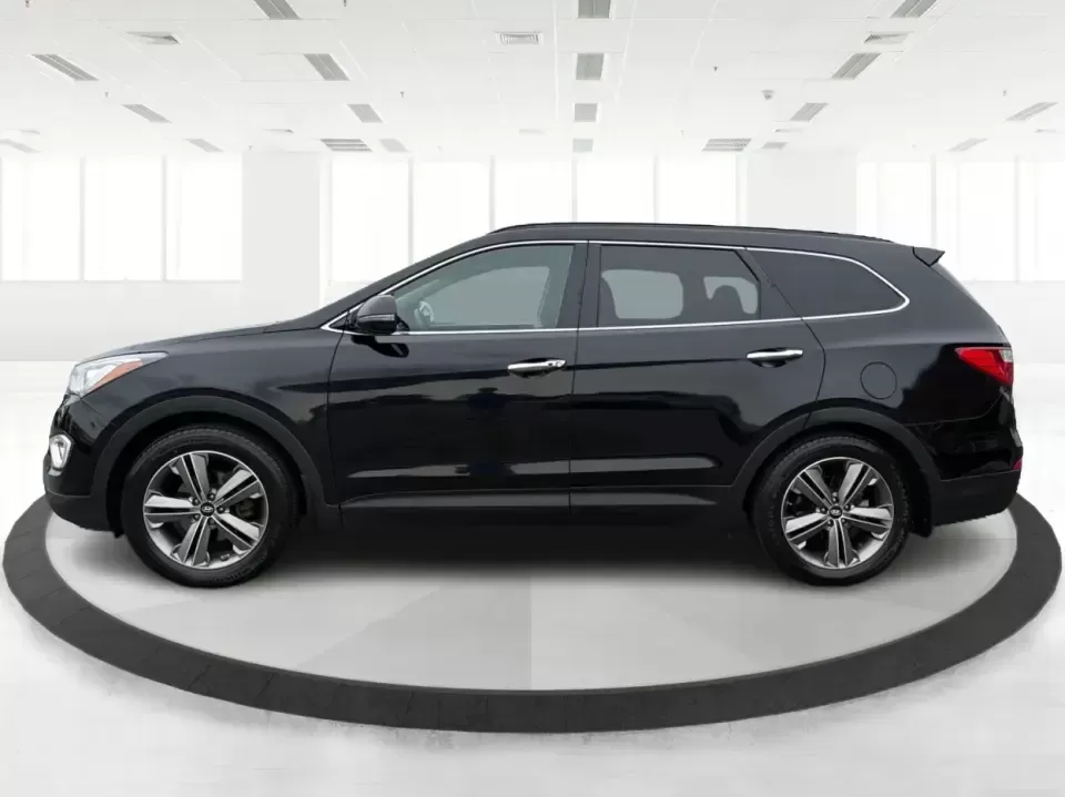 2014 Hyundai Santa Fe Limited AWD (KM8SRDHF4EU) with an 3.3L V6 DOHC 24V engine, 6-Speed Automatic transmission, located at 1230 East Main St, Xenia, OH, 45385, (937) 908-9800, 39.688026, -83.910172 - Picture your next weekend: loading up the family for a day at John Bryan State Park, heading out for youth sports in Beavercreek, or cruising I35 and US68 for an easy commute to Dayton. This 2014 Hyundai Santa Fe Limited AWD is built for real life in and around Xenia-roomy enough for growing familie - Photo#5