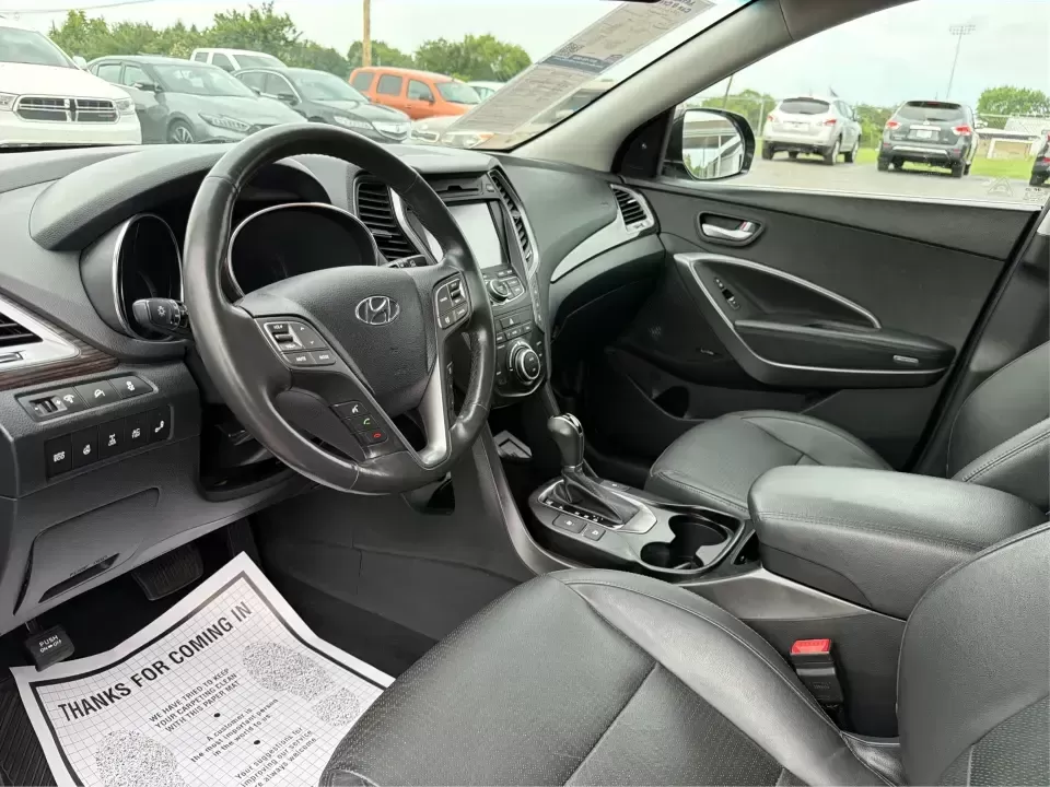 2014 Hyundai Santa Fe Limited AWD (KM8SRDHF4EU) with an 3.3L V6 DOHC 24V engine, 6-Speed Automatic transmission, located at 1230 East Main St, Xenia, OH, 45385, (937) 908-9800, 39.688026, -83.910172 - Picture your next weekend: loading up the family for a day at John Bryan State Park, heading out for youth sports in Beavercreek, or cruising I35 and US68 for an easy commute to Dayton. This 2014 Hyundai Santa Fe Limited AWD is built for real life in and around Xenia-roomy enough for growing familie - Photo#9