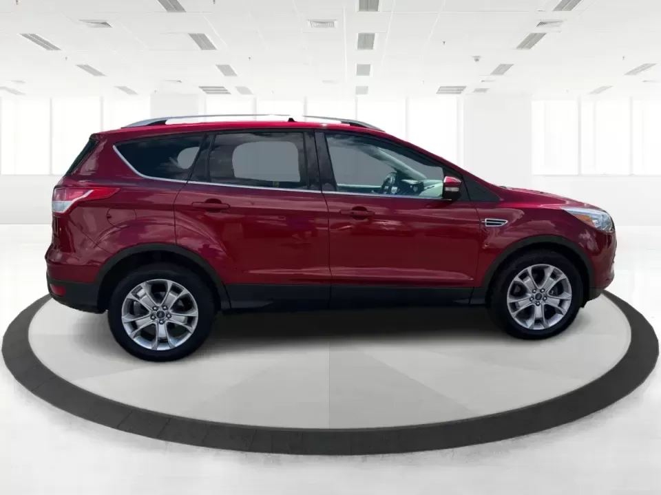 2014 Ford Escape Titanium 4WD (1FMCU9J91EU) with an 2.0L L4 DOHC 16V engine, 6-Speed Automatic transmission, located at 1099 N County Rd 25A , Troy, OH, 45373, (937) 908-9800, 40.057079, -84.212883 - Weekend getaways to Hocking Hills, snowy commutes up I75, or the everyday school-and-grocery loop around Troy-this 2014 Ford Escape Titanium 4WD is built for the kind of life that doesn't slow down when the weather changes. With seating for five, flexible cargo space, and confident four-wheel drive,- Photo#1