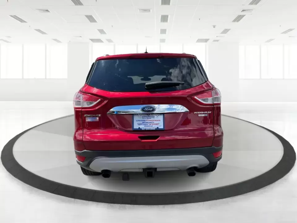 2014 Ford Escape Titanium 4WD (1FMCU9J91EU) with an 2.0L L4 DOHC 16V engine, 6-Speed Automatic transmission, located at 1099 N County Rd 25A , Troy, OH, 45373, (937) 908-9800, 40.057079, -84.212883 - Weekend getaways to Hocking Hills, snowy commutes up I75, or the everyday school-and-grocery loop around Troy-this 2014 Ford Escape Titanium 4WD is built for the kind of life that doesn't slow down when the weather changes. With seating for five, flexible cargo space, and confident four-wheel drive,- Photo#3
