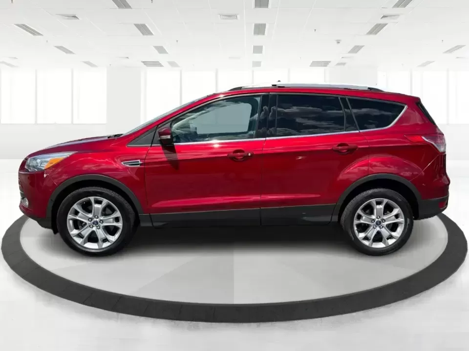 2014 Ford Escape Titanium 4WD (1FMCU9J91EU) with an 2.0L L4 DOHC 16V engine, 6-Speed Automatic transmission, located at 1099 N County Rd 25A , Troy, OH, 45373, (937) 908-9800, 40.057079, -84.212883 - Weekend getaways to Hocking Hills, snowy commutes up I75, or the everyday school-and-grocery loop around Troy-this 2014 Ford Escape Titanium 4WD is built for the kind of life that doesn't slow down when the weather changes. With seating for five, flexible cargo space, and confident four-wheel drive,- Photo#5