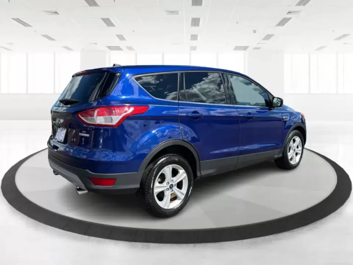2016 Ford Escape SE FWD (1FMCU0G94GU) with an 2.0L L4 DOHC 16V engine, 6-Speed Automatic transmission, located at 1099 N County Rd 25A , Troy, OH, 45373, (937) 908-9800, 40.057079, -84.212883 - Pack up the kids, load the groceries, or point the nose toward a weekend getaway-this 2016 Ford Escape SE FWD is the kind of compact SUV that fits real life in Troy, Ohio. With seating for five, versatile cargo space, and fuel-friendly efficiency (23 city / 32 highway MPG), it's a smart match for co- Photo#2