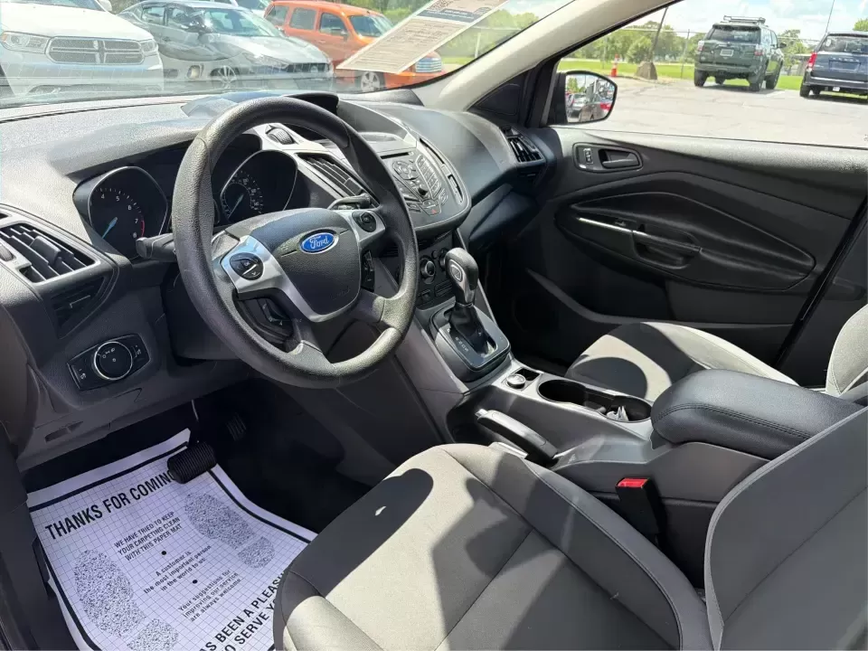 2014 Ford Escape S FWD (1FMCU0F75EU) with an 2.5L L4 DOHC 16V engine, 6-Speed Automatic transmission, located at 1184 Kauffman Ave, Fairborn, OH, 45324, (937) 908-9800, 39.807072, -84.030914 - Need a practical SUV that fits real life in the Miami Valley-school drop-offs, Wright-Patterson AFB commutes, grocery runs, and weekend getaways to John Bryan State Park? This 2014 Ford Escape S FWD in Oxford White is a smart, budget-friendly choice with the versatility to handle busy schedules and- Photo#9