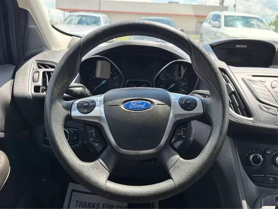 2014 Ford Escape S FWD (1FMCU0F75EU) with an 2.5L L4 DOHC 16V engine, 6-Speed Automatic transmission, located at 1184 Kauffman Ave, Fairborn, OH, 45324, (937) 908-9800, 39.807072, -84.030914 - Need a practical SUV that fits real life in the Miami Valley-school drop-offs, Wright-Patterson AFB commutes, grocery runs, and weekend getaways to John Bryan State Park? This 2014 Ford Escape S FWD in Oxford White is a smart, budget-friendly choice with the versatility to handle busy schedules and- Photo#16