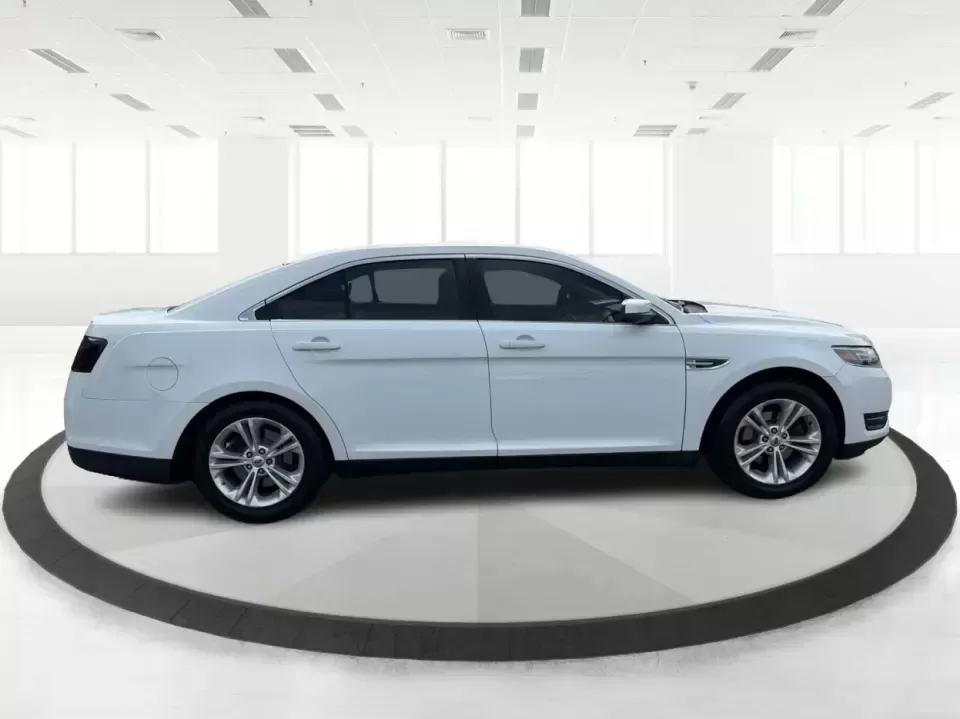 2015 Ford Taurus SEL FWD (1FAHP2E89FG) with an 3.5L V6 DOHC 24V engine, 6-Speed Automatic transmission, located at 1951 S Dayton Lakeview Rd., New Carlisle, OH, 45344, (937) 908-9800, 39.890999, -84.050255 - Need a comfortable, confident sedan for the daily commute, school drop-offs, and the occasional Dayton-to-Columbus road trip? This 2015 Ford Taurus SEL FWD is built for real life-roomy for five, smooth on longer drives, and packed with the kind of features that make every mile feel easier, whether y- Photo#1