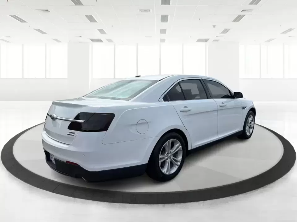 2015 Ford Taurus SEL FWD (1FAHP2E89FG) with an 3.5L V6 DOHC 24V engine, 6-Speed Automatic transmission, located at 1951 S Dayton Lakeview Rd., New Carlisle, OH, 45344, (937) 908-9800, 39.890999, -84.050255 - Need a comfortable, confident sedan for the daily commute, school drop-offs, and the occasional Dayton-to-Columbus road trip? This 2015 Ford Taurus SEL FWD is built for real life-roomy for five, smooth on longer drives, and packed with the kind of features that make every mile feel easier, whether y- Photo#2