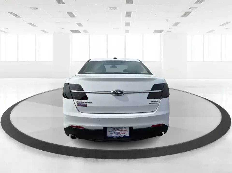 2015 Ford Taurus SEL FWD (1FAHP2E89FG) with an 3.5L V6 DOHC 24V engine, 6-Speed Automatic transmission, located at 1951 S Dayton Lakeview Rd., New Carlisle, OH, 45344, (937) 908-9800, 39.890999, -84.050255 - Need a comfortable, confident sedan for the daily commute, school drop-offs, and the occasional Dayton-to-Columbus road trip? This 2015 Ford Taurus SEL FWD is built for real life-roomy for five, smooth on longer drives, and packed with the kind of features that make every mile feel easier, whether y- Photo#3
