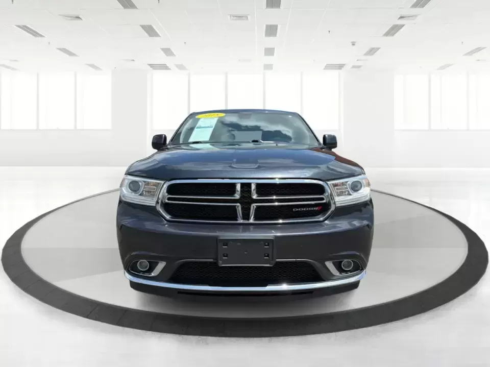 2015 Dodge Durango SXT AWD (1C4RDJAGXFC) with an 3.6L V6 DOHC 24V engine, 8-Speed Automatic transmission, located at 8750 N County Rd 25A, Piqua, OH, 45356, (937) 908-9800, 40.164391, -84.232513 - Need one SUV that can handle the school run, a long I75 commute, and a packed weekend at Indian Lake without feeling cramped? This 2015 Dodge Durango SXT AWD is built for real life in West Central Ohio-roomy for up to seven passengers, confident in changing weather, and versatile enough for everythi- Photo#7